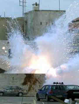Israeli shell exploding in Arafat's compound