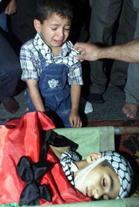little brother weeps over Mahmoud